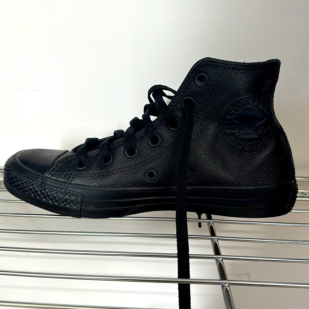 All black, leather high-top converse. Never worn!!